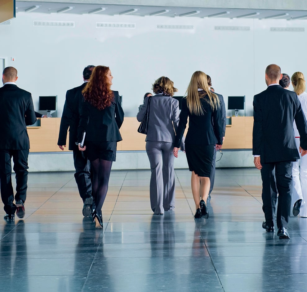 KT - A couple of businessmen walking together