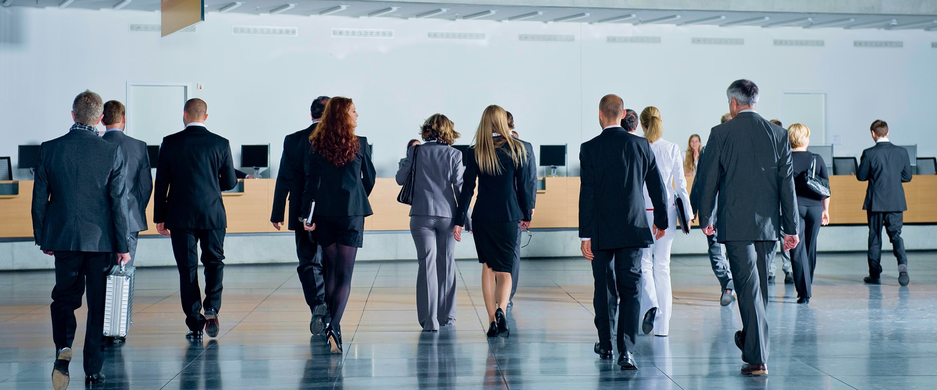 KT - A couple of businessmen walking together