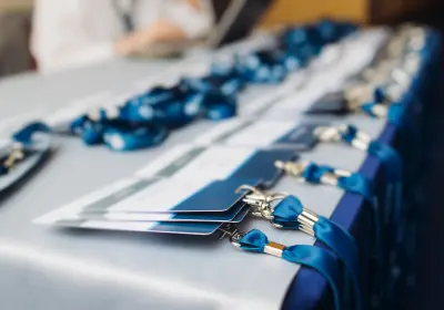 Conference name badges arranged for delegate registration