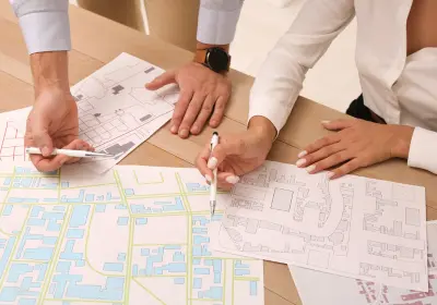 Team reviewing maps and plans during destination strategy planning