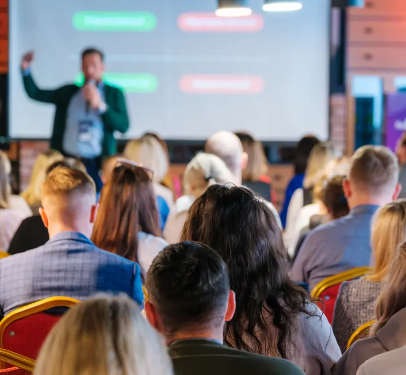 Man speaking at a conference