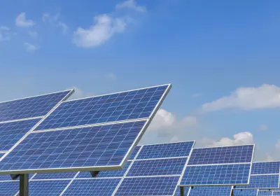 Solar panels generating renewable energy under a clear sky