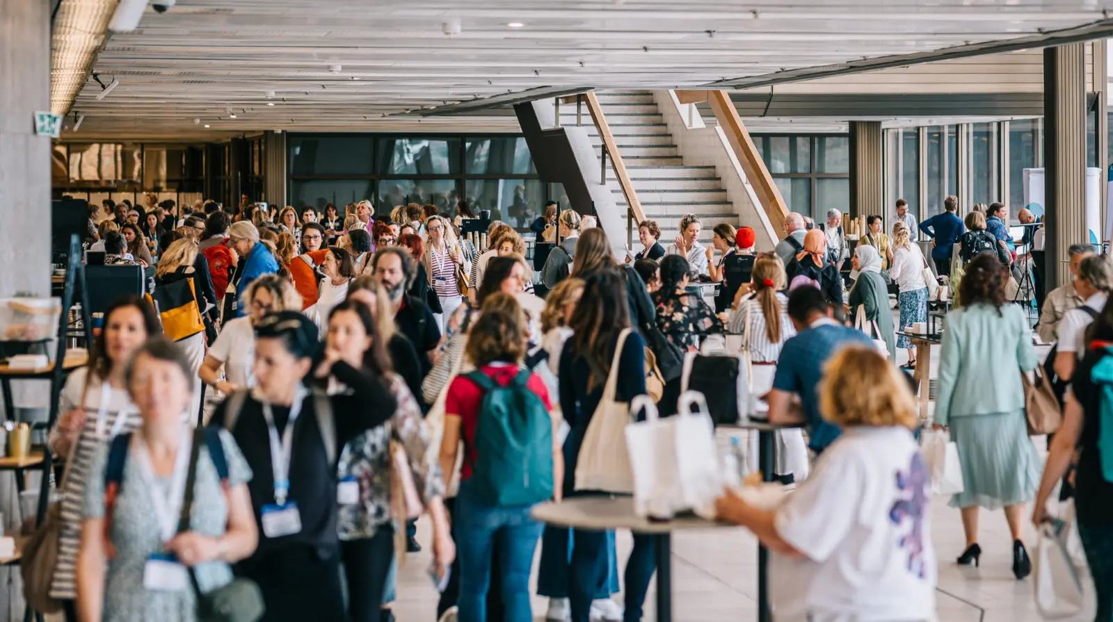 Attendees arriving and moving through the congress venue at the EMDR Europe Research & Practice Conference 2025