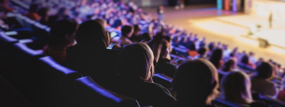 KT - Audience listening to speech