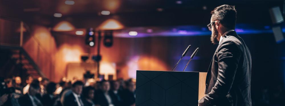 KT - Men doing a speech