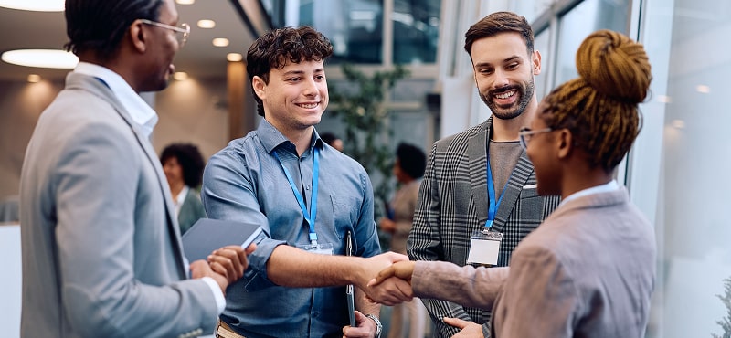 KT - 2 businessmen meeting and shaking hand