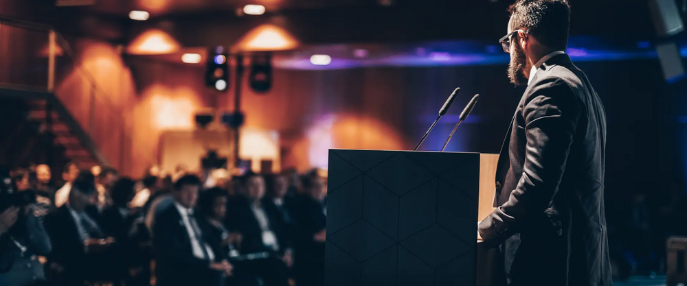 Man speaking during a congress